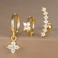 Macro shot of three gold S925 silver hoop earrings with zircon flowers and crystal detail - Arc Zircon Crawler Stud Style (Y26003-22) / Gold
