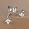 Detail of silver floral earrings set featuring zircons and a crown-shaped cartilage stud - Silver (Y26002-20)