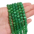 Strands of translucent green cat-eye stone beads showing a bright chatoyant effect - 8mm (Hole Approx 1.2mm) Approx 50 Pieces/Pack / Green