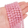Pink cat eye round glass beads for handmade jewelry making displayed in hand - 8mm (Hole Approx 1.2mm) Approx 50 Pieces/Pack / Pink
