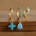 Macro shot showing the 925 silver stamp on gold plated turquoise drop earrings set - Gold Style 7