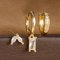 Detalle de un set de joyas bañadas en oro con circonitas rectangulares y de marquesa - Juego Circonia Blanca Oro / Dorado