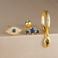 Conjunto de tres pendientes dorados de ojo turco con cristales azules y circonitas - Juego de 3 Piezas Ojo Turco Barbell (Y26036-8)
