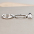 Detailed macro view of S925 sterling silver twist hoops and marquise zircon ear studs - Silver Round Hoop Crown Earrings Set / Silver