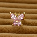 Macro view of golden butterfly ear stud featuring pink marquise-cut zircon stones - Gold Pink Rhinestone-Large