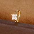 Golden flower hoop earring with white cubic zirconia on brown leather background - Four-petal Flower Style (Y20487-2) / 1 Piece / Gold