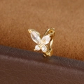 Macro shot of gold butterfly ear cuff with shimmering marquise and round cubic zirconia - Butterfly Style (Y20487-7) / 1 Piece / Gold