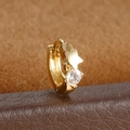 Detail shot of gold huggie hoop earring with star element and sparkling cubic zirconia - Star Style (Y20487-14) / 1 Piece / Gold