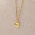 Collier médaillon cœur doré avec pierre de naissance violette et gravure rayon de soleil - Février