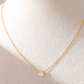 Collier en acier inoxydable plaqué or 18K avec zircon transparent en forme de goutte - Collier Pierre de Naissance Goutte / Avril