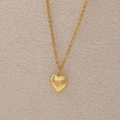 Golden heart locket necklace with pink birthstone and elegant frosted matte finish - July
