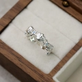 Gros plan détaillé sur une bague argentée avec motifs de coquillages et d'étoiles de mer - Étoile de Mer Argent (Plaqué Argent Épais)