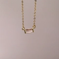 Minimalist gold stainless steel necklace with a rectangular pink gemstone pendant charm - November