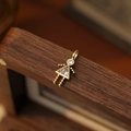 Pendentif fillette charmant fini or avec des zircons clairs ronds et triangulaires - Fille d'Avril