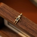Pendentif robot doré avec zircon blanc étincelant et pierre précieuse bleue - Garçon de Septembre