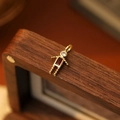 Robot charm pendant in gold plating with red and white cubic zirconia stones - July Boy