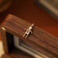 Charming gold robot pendant with rectangular pink zircon stone and round clear crystal - October Boy