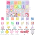 Kit bijoux perles colorées 24 compartiments avec perles macaron et fils élastiques - Thème Candy Land