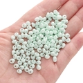 Mint green 5mm glass seed beads for DIY jewelry making and handmade bracelets - Light Blue-green Approximately 5x5mm Pore Size Approximately 1mm 10g/pack Approximately 100 Pieces.