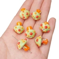 Handcrafted green mushroom glass beads with orange polka dots for DIY jewelry making - 1 Piece (Approx. 17x16mm) / Green with Orange and Red Dots Mushroom