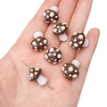 Handcrafted red mushroom glass beads for DIY jewelry making displayed on palm - 1 Piece (Approx. 17x16mm) / Brown with White Dots Mushroom