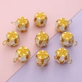 Golden 10mm hollow floral cloisonne bell charms with white petals and star enamel - Gold Yellow