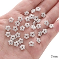 7mm silver alloy flower spacer bead for DIY jewelry making held in hand for scale - Five-Petal Flower / 10 Pieces/Pack (7mm) / Silver