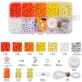 Bastelset für Schmuck mit 10 Fächern aus Glasperlen und Acrylperlen in warmen Farben - Gelbe Serie