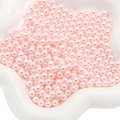 Loose light pink ABS pearl beads with glossy finish in a decorative white porcelain bowl - 3mm (10000 Pieces/Pack) / Light Pink