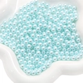Light blue ABS faux pearls for DIY crafts and makeup box filler in a white dish - Light Blue