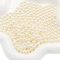 Bulk white glossy round ABS faux pearls for DIY crafts and makeup box filler - Off White