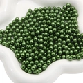 Dark green metallic ABS beads in a white ceramic dish for DIY craft projects - Army Green