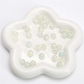 Translucent light green crackle glass round beads in a white star ceramic tray for DIY jewelry - Light Green