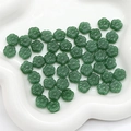Green flower-shaped glass beads for DIY necklaces and handmade jewelry accessories - Green Plum Blossom