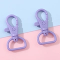 Pair of purple 360-degree rotating plastic lobster clasps for DIY keychains and lanyards - 22x40mm / Purple
