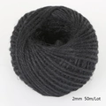 Detail view of 2mm black natural hemp rope roll, 50m length for DIY crafts packaging - 2mm-50m(CTJ01) / Black