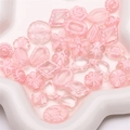 Detail of pink acrylic flower and bow beads for DIY jewelry making on white tray - 20g/Pack (Approx. 25-30 Pieces) / Pink