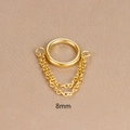 Macro shot of 8mm gold stainless steel hinged ring with double chain tassel details - 8mm / Gold