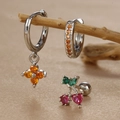 Macro shot of silver clover and cherry earrings with orange and pink gemstones - Red Cherry (Y26118-11) / Silver