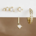 Set de tres pendientes bañados en oro con piedras de circonita y diseño climber elegante - Oro-Blanco