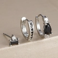 Dettaglio orecchini geometrici in argento con zirconi neri e pendente a goccia elegante - Argento-Nero