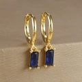 Detailed close-up of a gold-plated hoop earring with a square blue zircon drop pendant - Rectangular Gemstone Hoop (Y20278) / Gold-Dark Blue