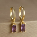 Macro shot of gold-plated hoop earrings featuring rectangular purple zircon pendants - Rectangular Gemstone Hoop (Y20278) / Gold-Purple