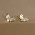 Macro detail of gold plated flower stud earrings with marquise cut zircon stones - Marquise Double Zirconia Leaf Stud (Y20283) / Gold-White