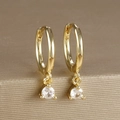 Detail macro view of gold plated hoop earrings with round zircon stones and polished finish - Round Gemstone Pendant Hoop (Y20301) / Gold-White