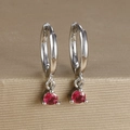 Close-up of silver-tone hoop earrings featuring brilliant-cut red zircon drop pendants - Round Gemstone Pendant Hoop (Y20301) / Silver - Red