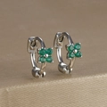 Macro shot of clover earrings with green zircon stones on champagne gold metal stand - Four-petal Flower Hoop (Y20309) / Silver - Green