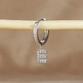 Macro shot of silver-tone hoop earring with micro-pave zircon letter E pendant - 1 Piece / Silver-Letter E