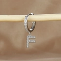 Detail of silver letter F earring with micro-paved zircons on a rustic wooden stand - 1 Piece / Silver-Letter F
