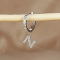 Detailed view of micro-pave zircon letter N charm earring on a wooden display stand - 1 Piece / Silver-Letter N